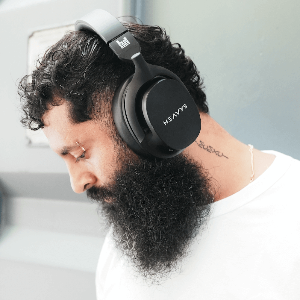 man wearing Heavys H1H wireless headphones 